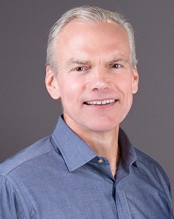 Pictured is the headshot of Andrew Franklin.
