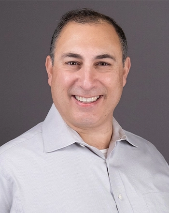Pictured is the headshot of Joe Barone.