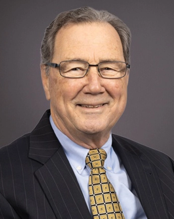 Headshot of Ken Brennan