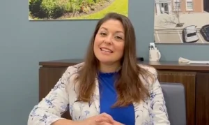 Michelle discussing what it's like to be part of The Village Bank.