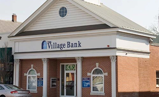 Pictured is the Newtonville Village Bank location.