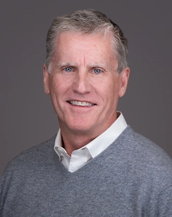 Pictured is the headshot of Robert Dolan.